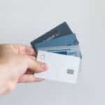 hand holding credit cards